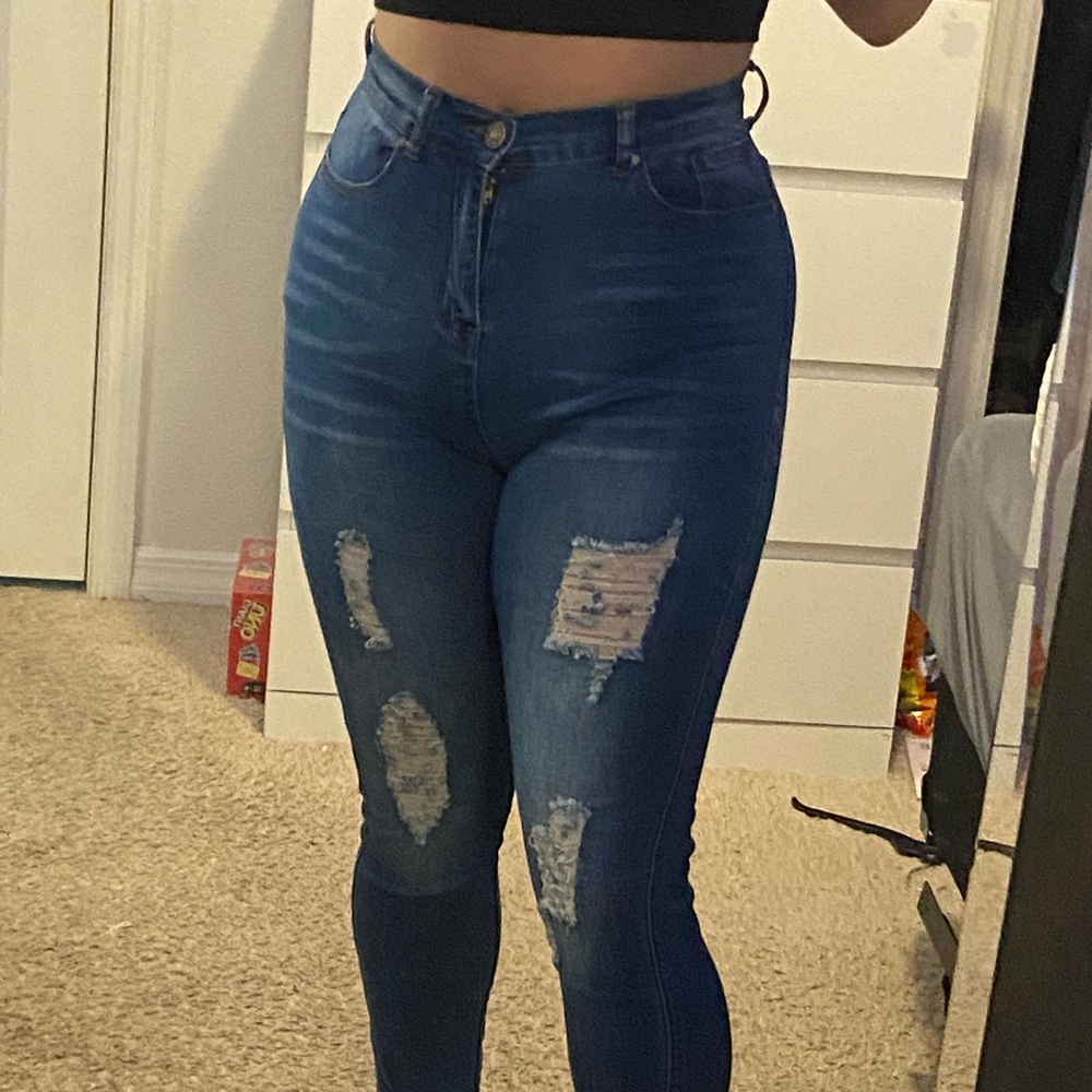 FashionNova Medium-Wash High-Rise skinny jeans.